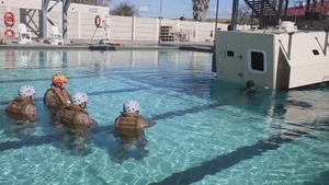 B-Roll: U.S. Marines with the Assault Amphibian School participate in submerged vehicle egress training