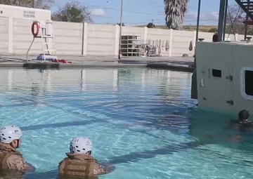 B-Roll: U.S. Marines with the Assault Amphibian School participate in submerged vehicle egress training