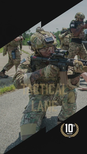 Participants of the 10th Annual Best Combat Camera Competition prepare to compete in an event.