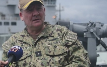 RDML Scott Sciretta, Commander, Standing NATO Maritime Group Two, speaks to the French media