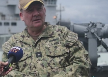 RDML Scott Sciretta, Commander, Standing NATO Maritime Group Two, speaks to the French media