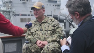 RDML Scott Sciretta, Commander, Standing NATO Maritime Group Two, speaks to the French media