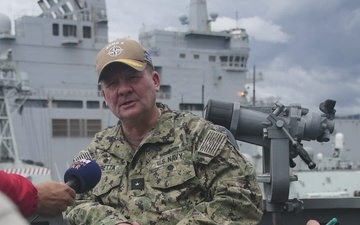 RDML Scott Sciretta, Commander, Standing NATO Maritime Group Two, speaks to the French media