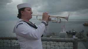 Sailor plays "Taps"