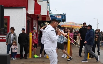 Sailors assigned to Navy Band Southwest play at the Santa Monica Pier during LAFW