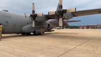 U.S. Airmen refuel an A-10 Thunderbolt from a C-130 Hercules