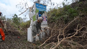 Seabees Clear Road Debris in Humatak after Typhoon Mawar