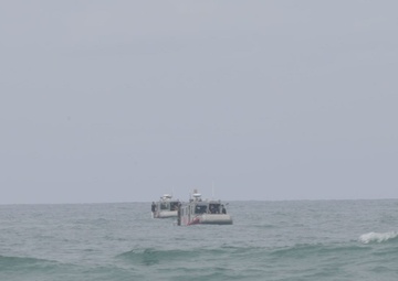 B-Roll: Marines swim to shore during amphibious qualification