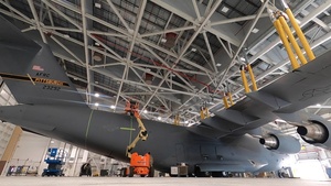 911th Airlift Wing adds world War II invasions stripes to C-17 Globemaster III