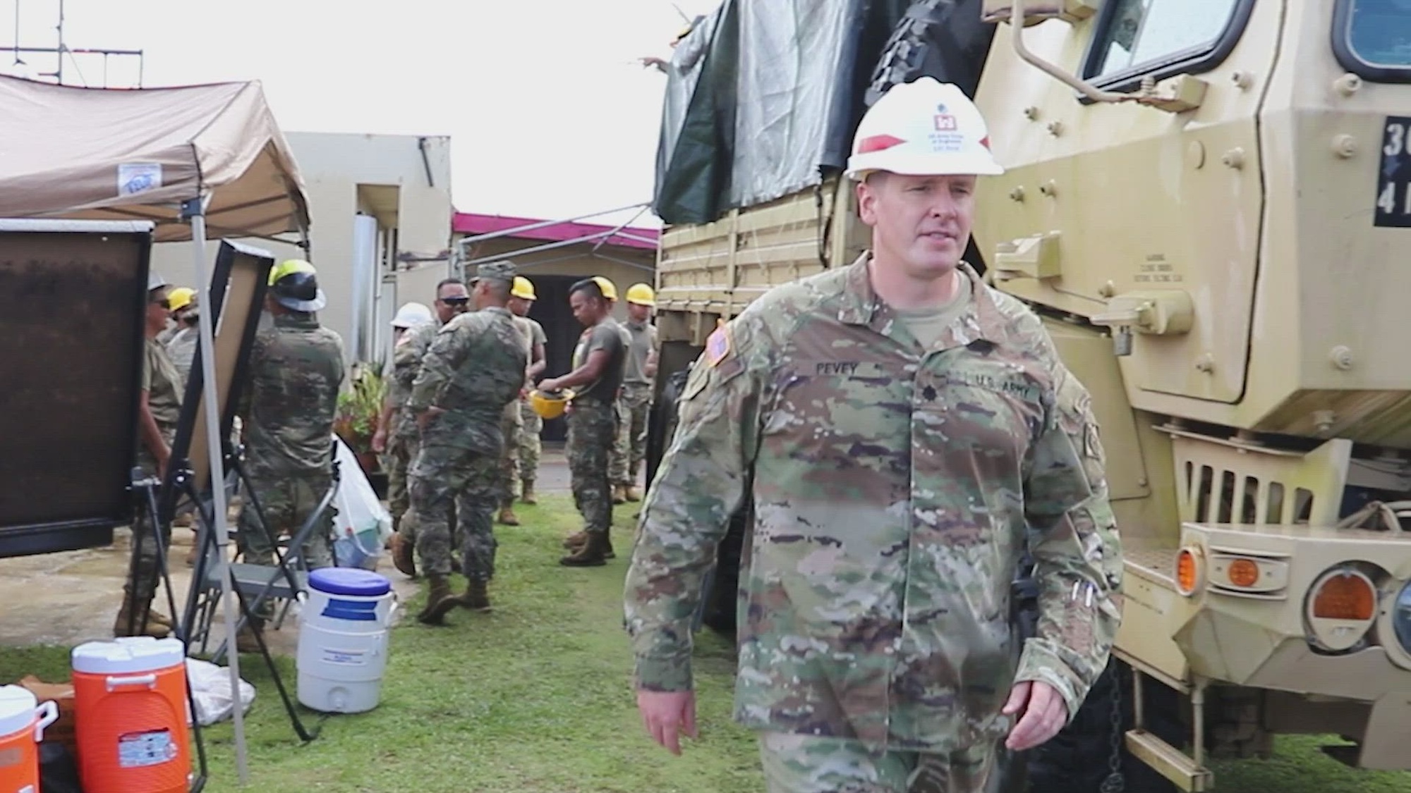 Lt. Col. Ryan Pevey, Honolulu District Commander, joins Soldiers from the 797th Engineering Company assigned to Joint Task Force RISEUP, conduct temporary roofing repairs in Dededo, Guam, June 17. The U.S. Department of Defense, U.S. Army Corps of Engineers, in coordination with the Guam Homeland Security/Office of Civil Defense, the Federal Emergency Management Agency and the Mayor’s Council of Guam, launched the Roofing Installation Support Emergency Utilization Program, (RISEUP) to help temporarily repair metal roofs damaged by Typhoon Mawar.