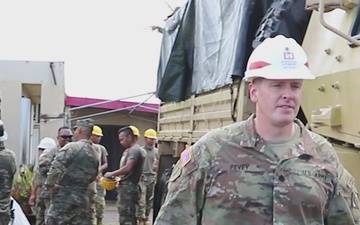 USACE District Commander joins 797 Engineering Company on RISEUP temporary roof construction