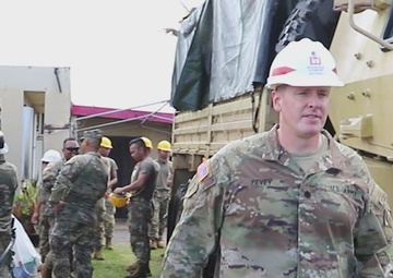 USACE District Commander joins 797 Engineering Company on RISEUP temporary roof construction