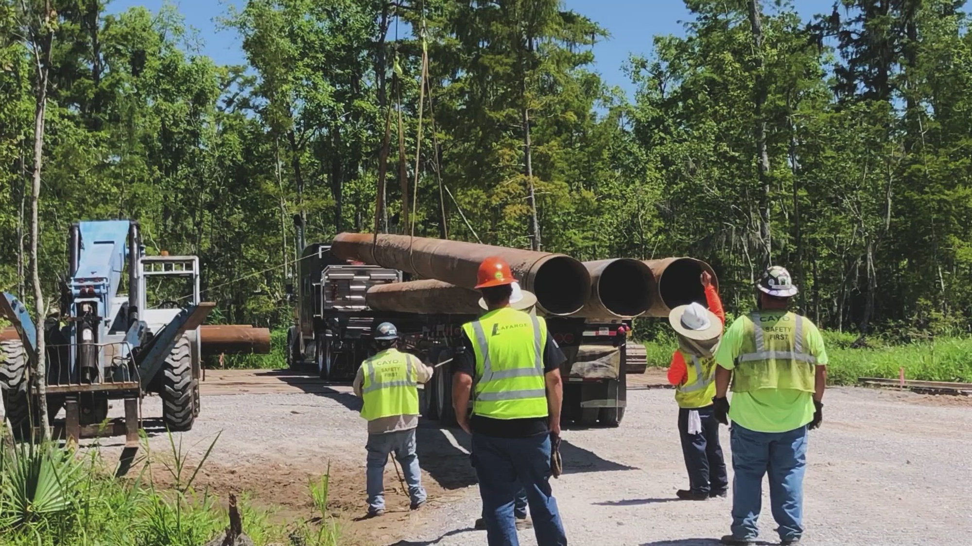 Special delivery! Pile unloading has begun at the Relief Reserve site. This will mark the footprint of the levee. The piles are used to test the support capacity of the pump station to come.