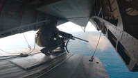 U.S. Marines shoot machine guns on a CH-53E Super Stallion during Distributed Aviation Operations Exercise 3 (B-Roll)