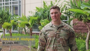 Maj. Carl E. Hodgson shouts out the St. Louis Cardinals
