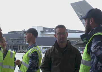 B-Roll: U.S Marines and Australian Airmen load CATM-120 Missiles together