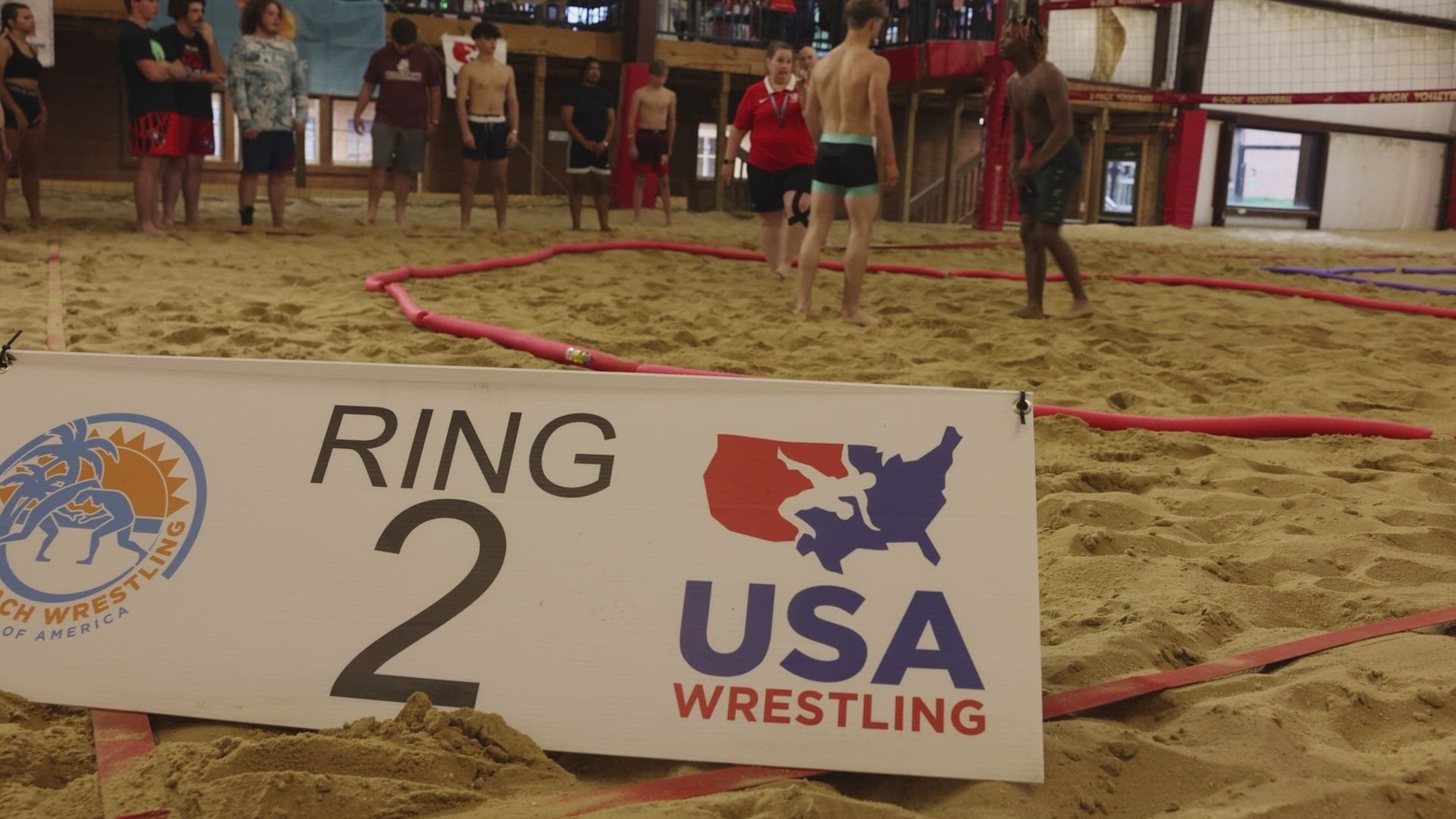 U.S. Marines interact with wrestlers during the Kentucky Beach Wrestling State Open tournament at Louisville, Kentucky, July 1, 2023.  The event provided the Marines the opportunity to connect with the local community and raise  Marine Corps awareness.  (U.S. Marine Corps video by Cpl. Bernadette Pacheco)