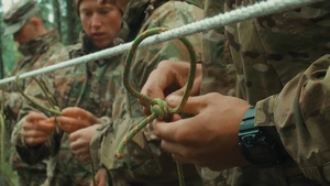 National Best Warrior Competitors Practice Knots and Call for Fire