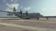 Marine Aerial Refueler Transport Squadron (VMGR) 252 trains with mission-oriented protective posture gear in a KC-130J Super Hercules