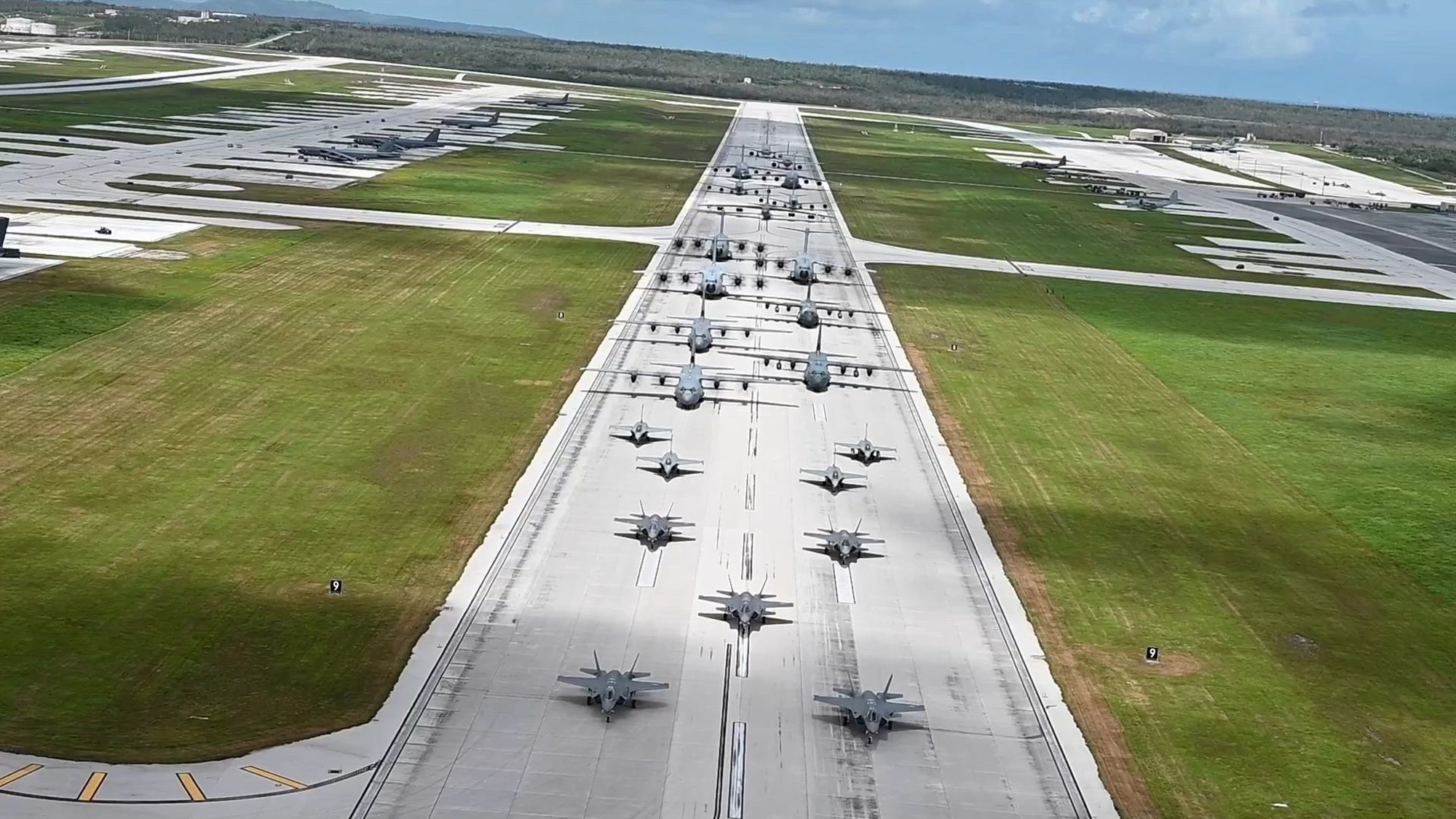 U.S. and Allied aircraft conduct an elephant walk on Andersen Air Force Base, Guam, July 19, 2023. More than 15,000 U.S. and Allied forces are participating in various exercise across the INDOPACOM area of responsibility to enhance readiness and interoperability. (U.S. Air Force video by Tech. Sgt. Michael Cossaboom, Tech. Sgt. James Cason, Staff Sgt. Taylor Crul, and Staff Sgt. Christian Sullivan)