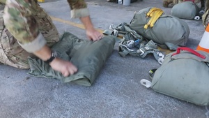 U.S. and Multinational Partners jump out of a C-130 during TRADEWINDS 2023