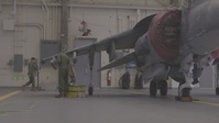 U.S. Marines with Marine Aircraft Group 14 maintain AV-8B Harrier II aircraft (B-Roll)