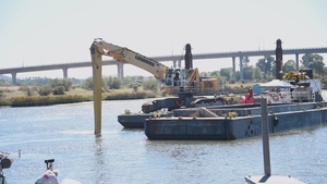 Long shot of dredge in Napa River