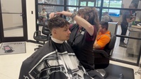 Hair artist honors heroes with scissors and smiles