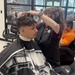Hair artist honors heroes with scissors and smiles