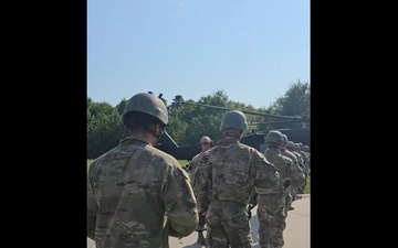 Officer candidates load onto a Black Hawk