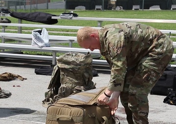 Soldiers competing in the U.S. Army Forces Command Best Squad Competition conduct a equipment layout