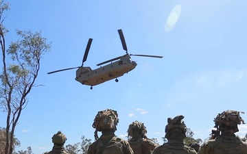 Australian soldiers conduct air mobile operations in support of a combined arms live fire exercise