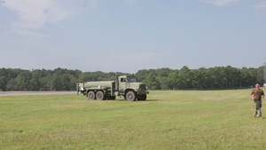 Large Scale Exercise 2023: U.S. Marines and Sailors operate a forward refueling point