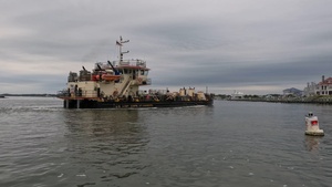 The MURDEN dredges the Ocean City Inlet