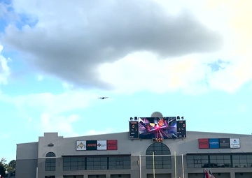 All-black AC-130J Gunship crew performs flyover at Red Tails Classic