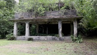Peleliu B-Roll: Japanese Military Headquarters Building, U.S. Army 323rd Infantry Monument and Lookout, U.S. Marine Corps Monument, and Orange Beach
