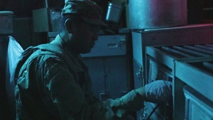 Army field cooks prepare food in field at Saber Junction 23