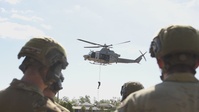 U.S. Marines and Australian Soldiers practice fast rope techniques