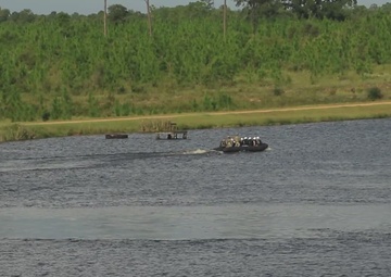 Raiders and Black Diamonds conduct wet gap crossing