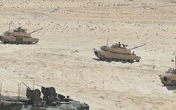 U.S. Soldiers assigned to Task Force Reaper, maneuver M1A2 Abrams Tanks in preparation for a combined live fire exercise during exercise Bright Star 2023