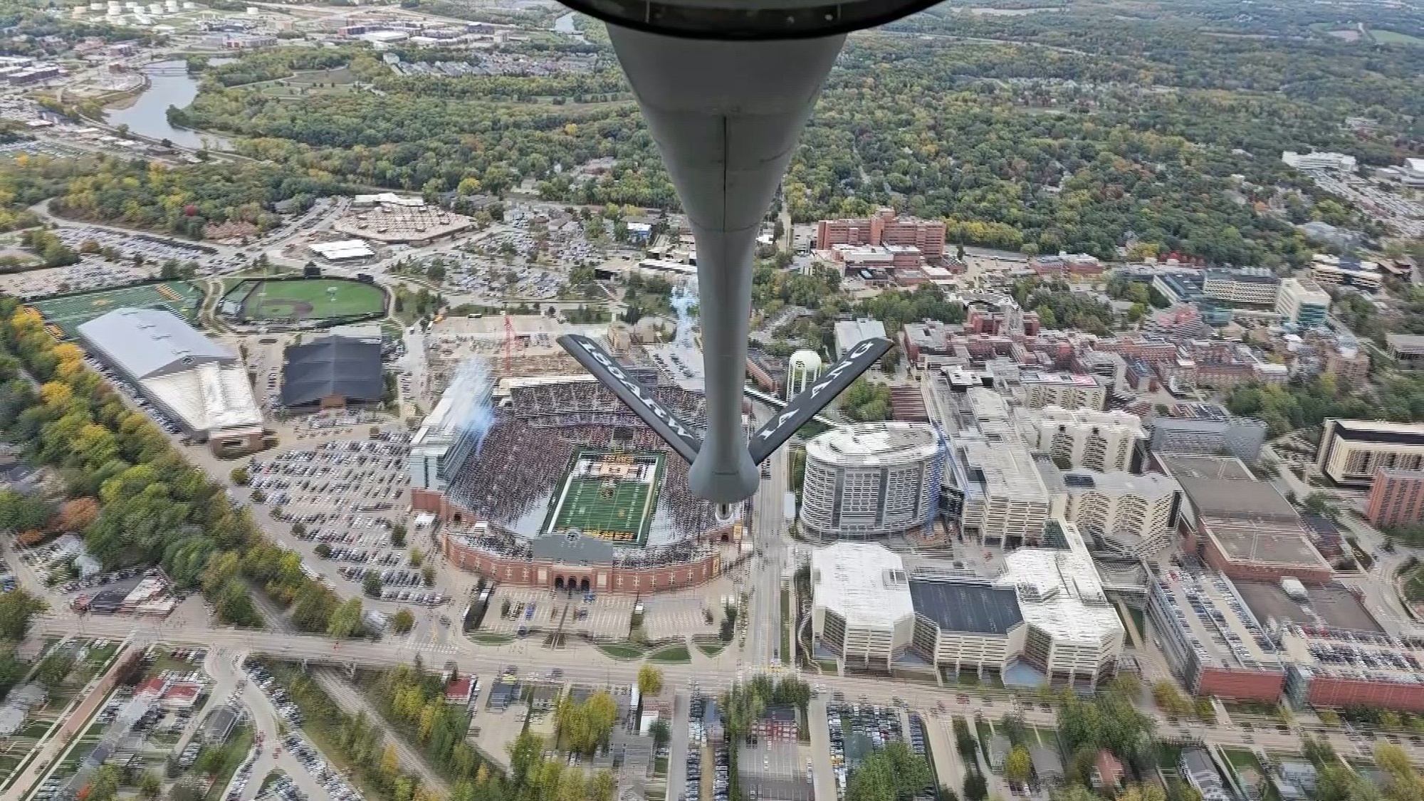 B-roll video shows the view from a U.S. Air Force KC-135 Stratotanker performing a flyover at the Crossover at Kinnick, Iowa Women’s outdoor basketball game in Iowa City on Sunday, October 15, 2023.<br /><br />The historic venue for the Iowa Air National Guard pregame flyover featured a refueling aircraft from the Iowa Air National Guard passing over the University of Iowa’s football stadium where the event was held.<br /><br />The 185th Air Refueling Wing was invited to perform the flyover as the Iowa Hawkeye women took on the Blue Demons from Depual in Iowa City.<br /><br />The home team flyover is thrilling for unit members who had a chance to be a part of the excitement of Big Ten basketball.