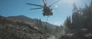 U.S. Marines, Sailors, and Forest Service personnel prepare and recover a downed U.S. Navy MH-60S Seahawk