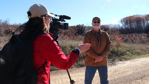 Fort McCoy Natural Resources Branch Chief speaks to media aboout prescribed burn process