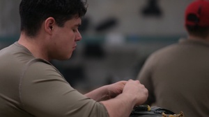 11th Airborne Division Soldier Packs Parachutes