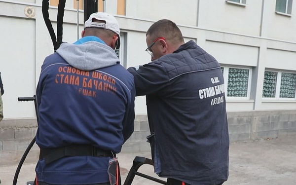 KFOR CIMIC team provides log splitter to Leposavic school district