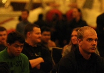 USS Gerald R. Ford Sailors Watch the Army Navy Football Game While on Deployment