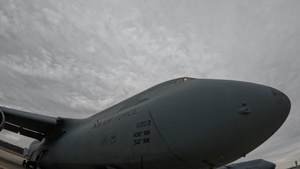 B-ROLL Dover Air Force Base 512th Airlift Wing Airmen Conduct Maintenance on and Preflight C-5M Super Galaxy Aircraft