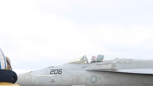 File:US Navy 040626-N-9293K-060 Student Pilots prepare to exit a T-45C  Goshawk during flight operations aboard the USS Abraham Lincoln CVN 72.jpg  - Wikimedia Commons