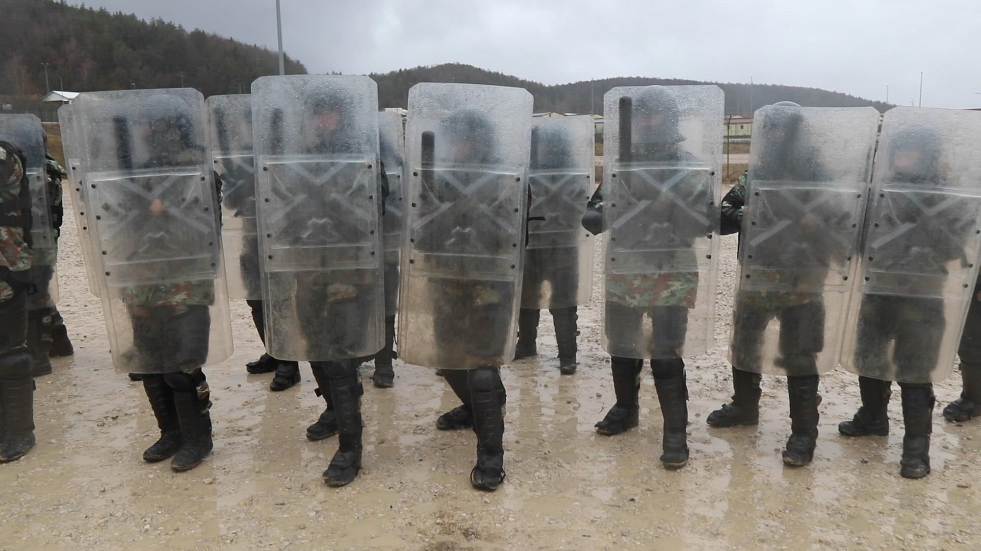 Albanian soldiers conduct riot training during Exercise Kosovo Forces 33 (KFOR) in Hohenfels Training Area, Germany, Feb. 1, 2024. KFOR 33 is a multinational training event conducted to prepare the Albanian Soldiers for their deployment to the Kosovo Regional Command East. (U.S. Army video by Spc. Thomas Dixon)