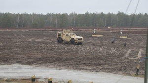 Task Force Provider Soldiers execute a convoy live fire exercise